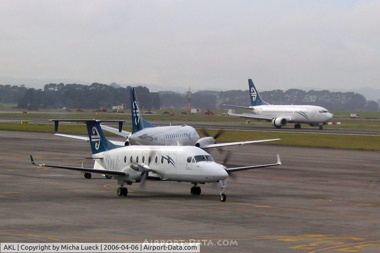 Auckland International Airport, Auckland New Zealand (AKL) - Busy scene at Auckland, with Air NZ's Beech 1900D, Saab 340, and B 737-300