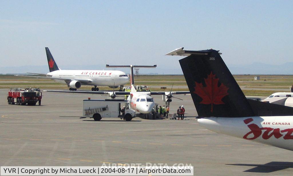 Vancouver International Airport, Vancouver, British Columbia Canada (YVR) - Some incident triggered the fire crew out to Air Canada Jazz's DHC 8