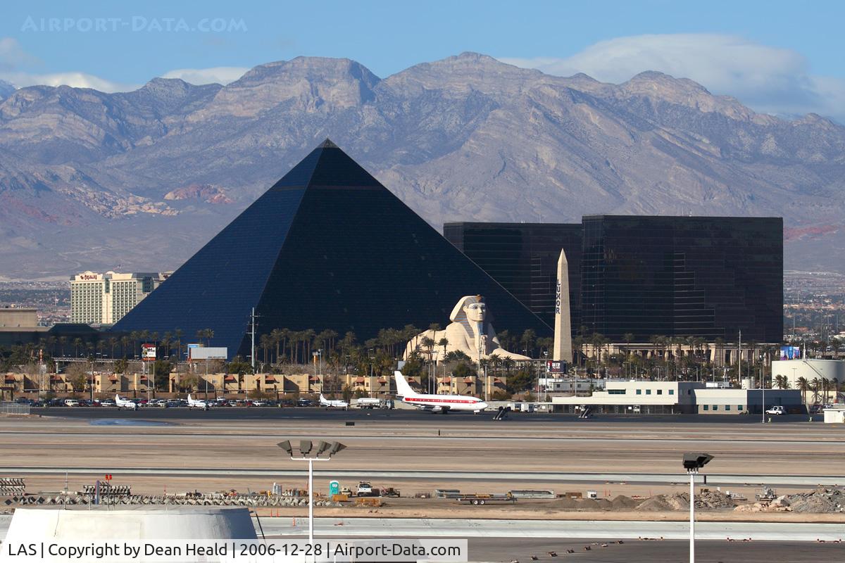 Harry Reid International Airport (LAS) - Looking west from the airport's main parking structure, you get a nice view of the Luxor Hotel & Casino and the mountains.