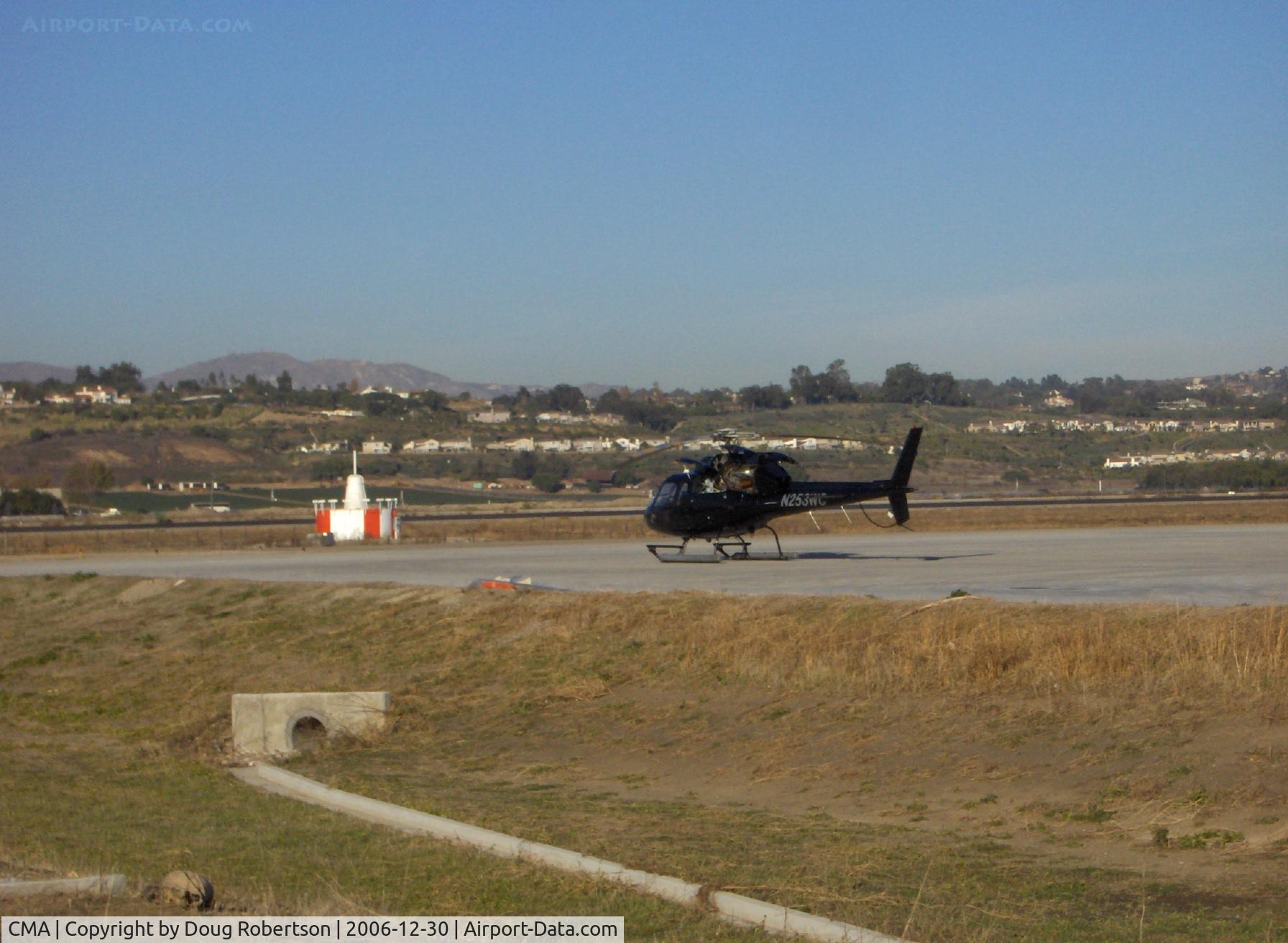 Camarillo Airport (CMA) - VOR CMA 115.8 TX ANTENNA on Field, N253WC 1982 Aerospatiale AS355F2 ECUREUIL (Squirrel) 2/TWINSTAR helo to right of VOR