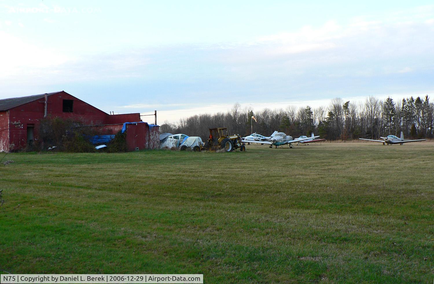 N75 Airport - Never have I seen so many derelict aircraft at a single airport.  Nevertheless, like the old aircraft out front, this fine little airport is trying to stay alive.