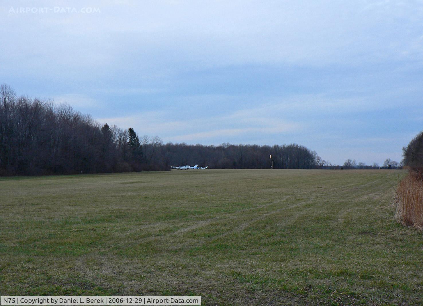 N75 Airport - This view of the main turf runway is taken from the south.  This would be a great place to land a Piper Cub!
