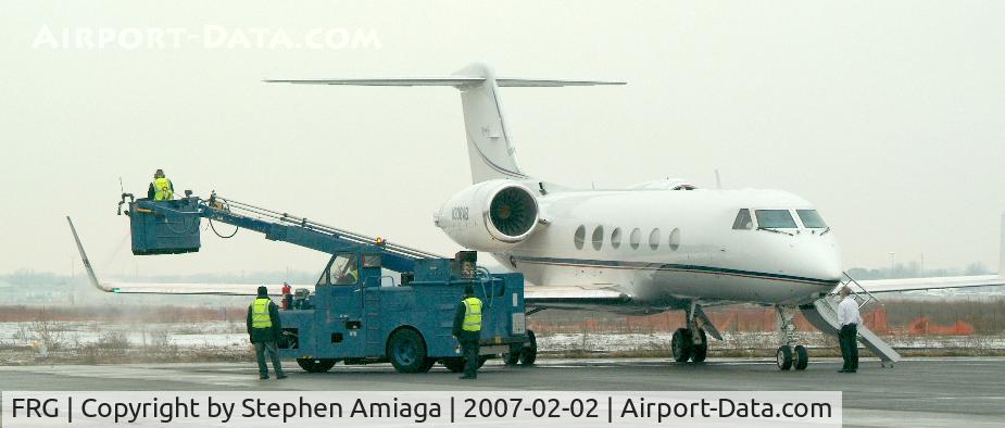 Republic Airport (FRG) - Deicing this G-IV SP prior to Departure...
