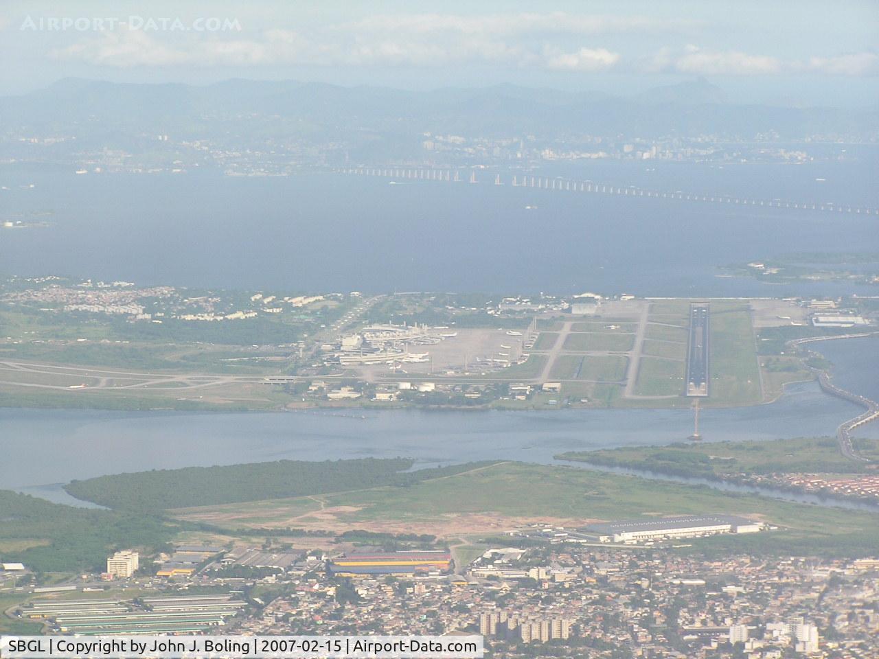 Galeão Airport, Antônio Carlos Jobim International Airport Brazil (SBGL) - Looking down runway 15. Main Terminal on left. Aircraft in takeoff position on runway 10 far left side of photo