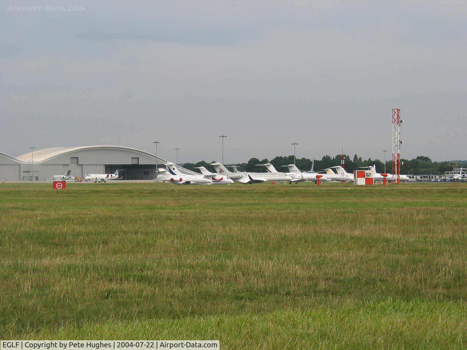 Farnborough Airfield Airport, Farnborough, England United Kingdom (EGLF) - The terminal and biz-jets at Farnborough, Hants, UK