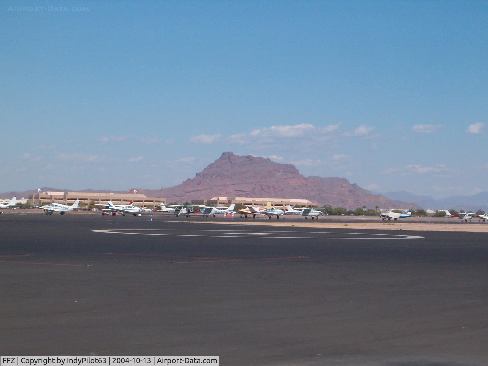 Falcon Fld Airport (FFZ) - Tarmac with Red Mountain in the backround.
