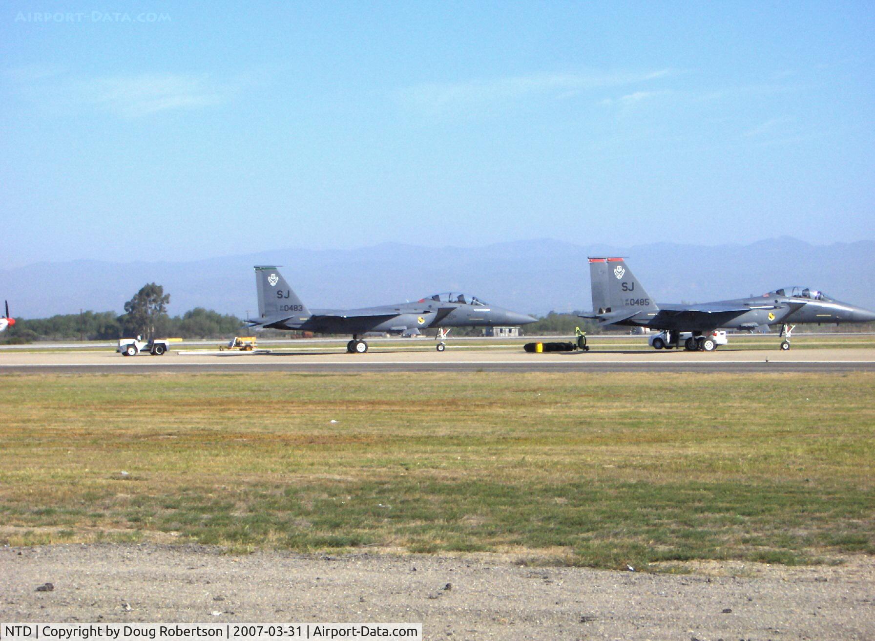 Point Mugu Nas (naval Base Ventura Co) Airport (NTD) - USAF McDonnell Douglas F-15E STRIKE EAGLE air superiority fighters, two Pratt & Whitney F100-PW-220 afterburning turbofans 23,760 lb st each. Long range APG-70 radar and LANTIRN system. One 20mm Vulcan M61A1 cannon, AIM-9 Sidewinders or AIM-120 AMRAAMs