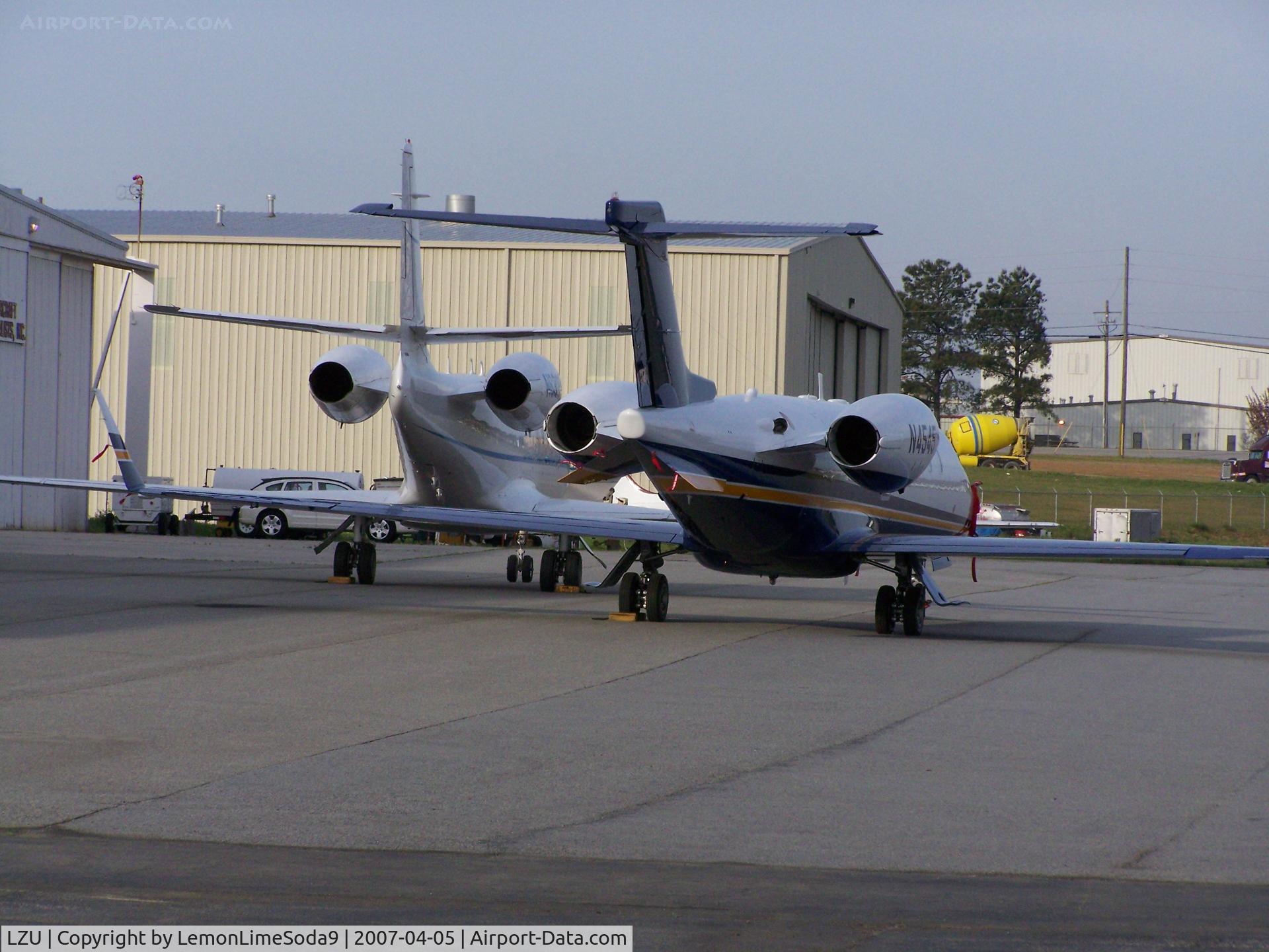 Gwinnett County - Briscoe Field Airport (LZU) - Two jets sitting net to each other.
