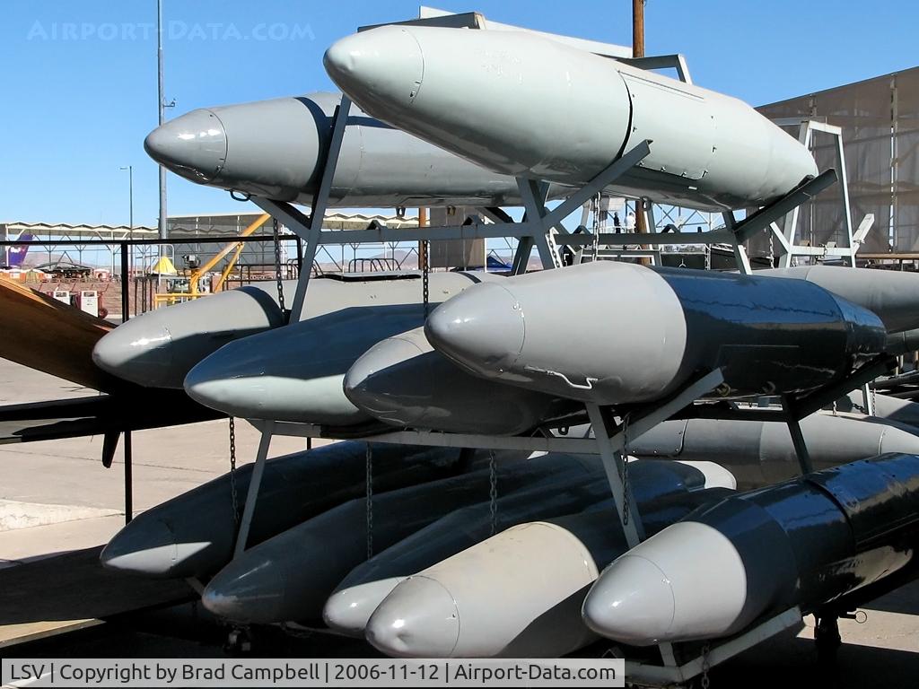 Nellis Afb Airport (LSV) - Spare fuel tanks behind the tarmac during Aviation Nation 2006 at Nellis AFB.