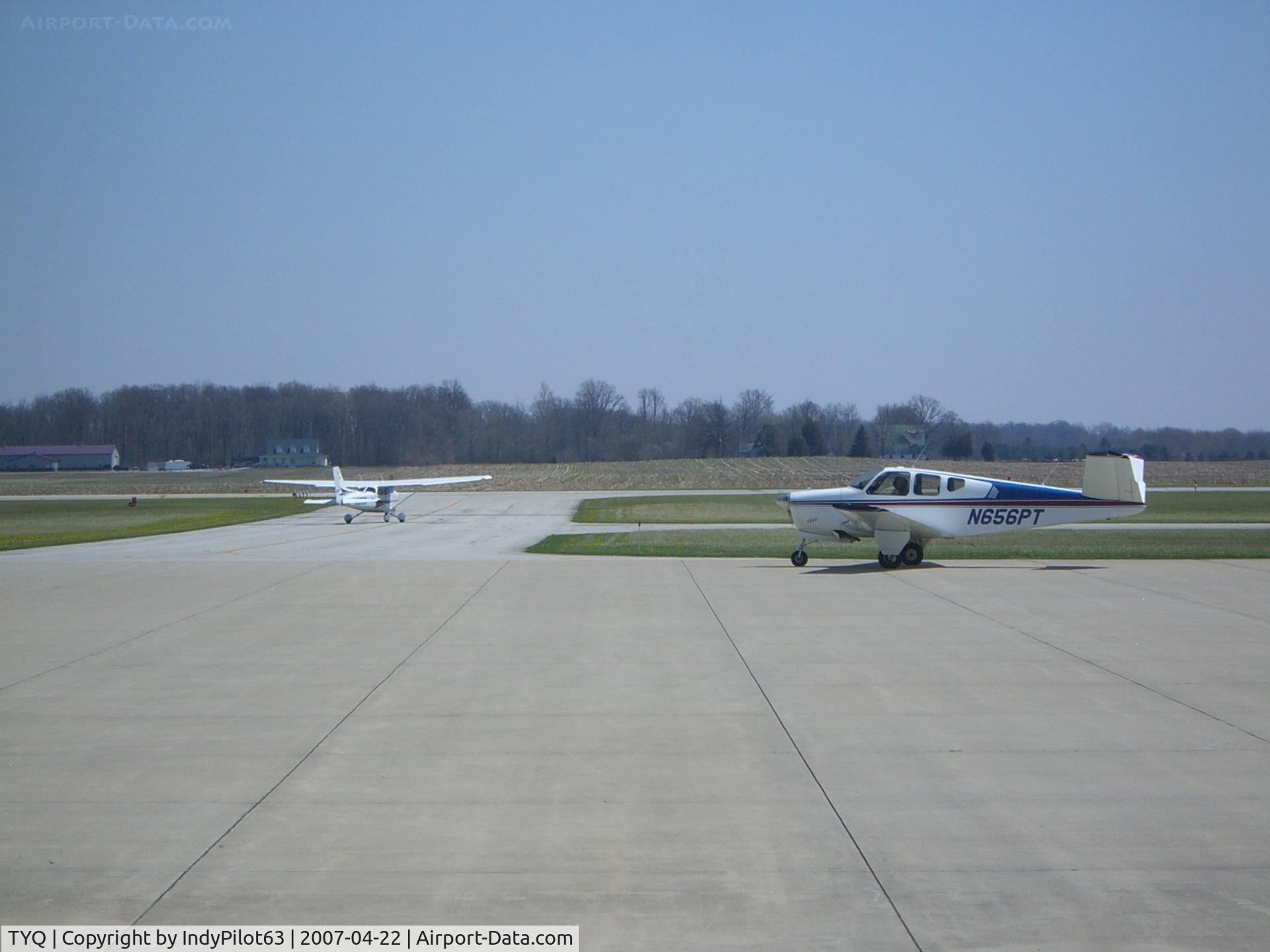 Indianapolis Executive Airport (TYQ) - A nice shot of two aircraft taxiing to runway 18.