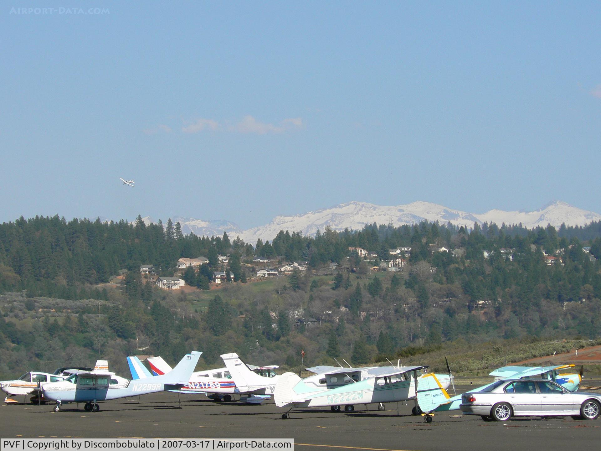 Placerville Airport (PVF) - Sierra Nevada behind an approaching plane into Placerville.