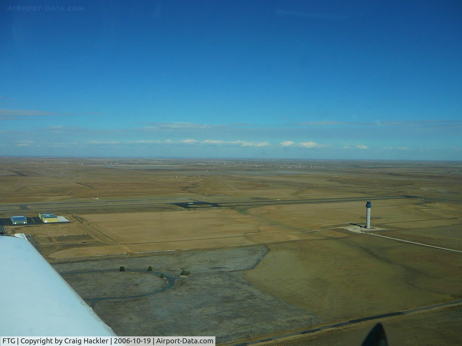 Front Range Airport (FTG) - Downwind Runway 26.