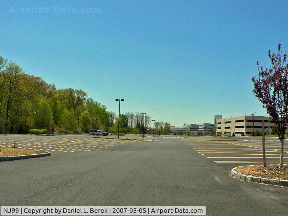 NJ99 Airport - This was the site of the Warner-Lambert parking lot heliport; the former drug company's facilities have been greatly expanded and are now part of Johnson & Johnson.