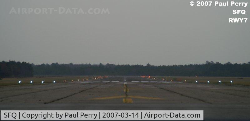 Suffolk Executive Airport (SFQ) - Runway Seven with the lights still on at sunrise