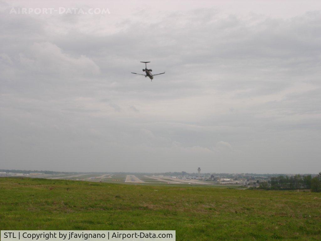 Lambert-st Louis International Airport (STL) - Very windy day, this CRJ-200 was battling a nice crosswind with a hefty crab.