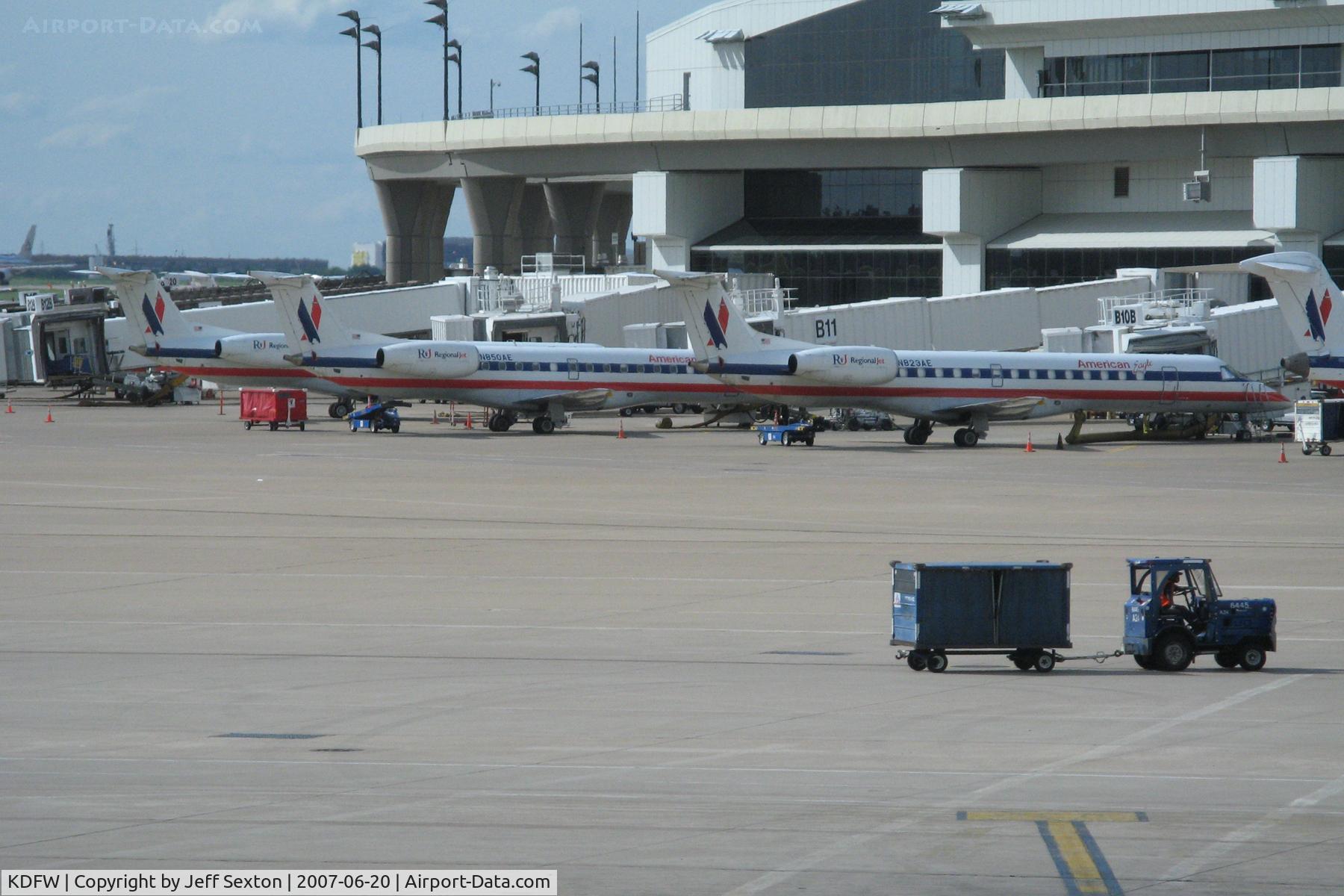 Dallas/fort Worth International Airport (DFW) - Terminal B at DFW with American Eagle Embraer EMB-135 Aircraft