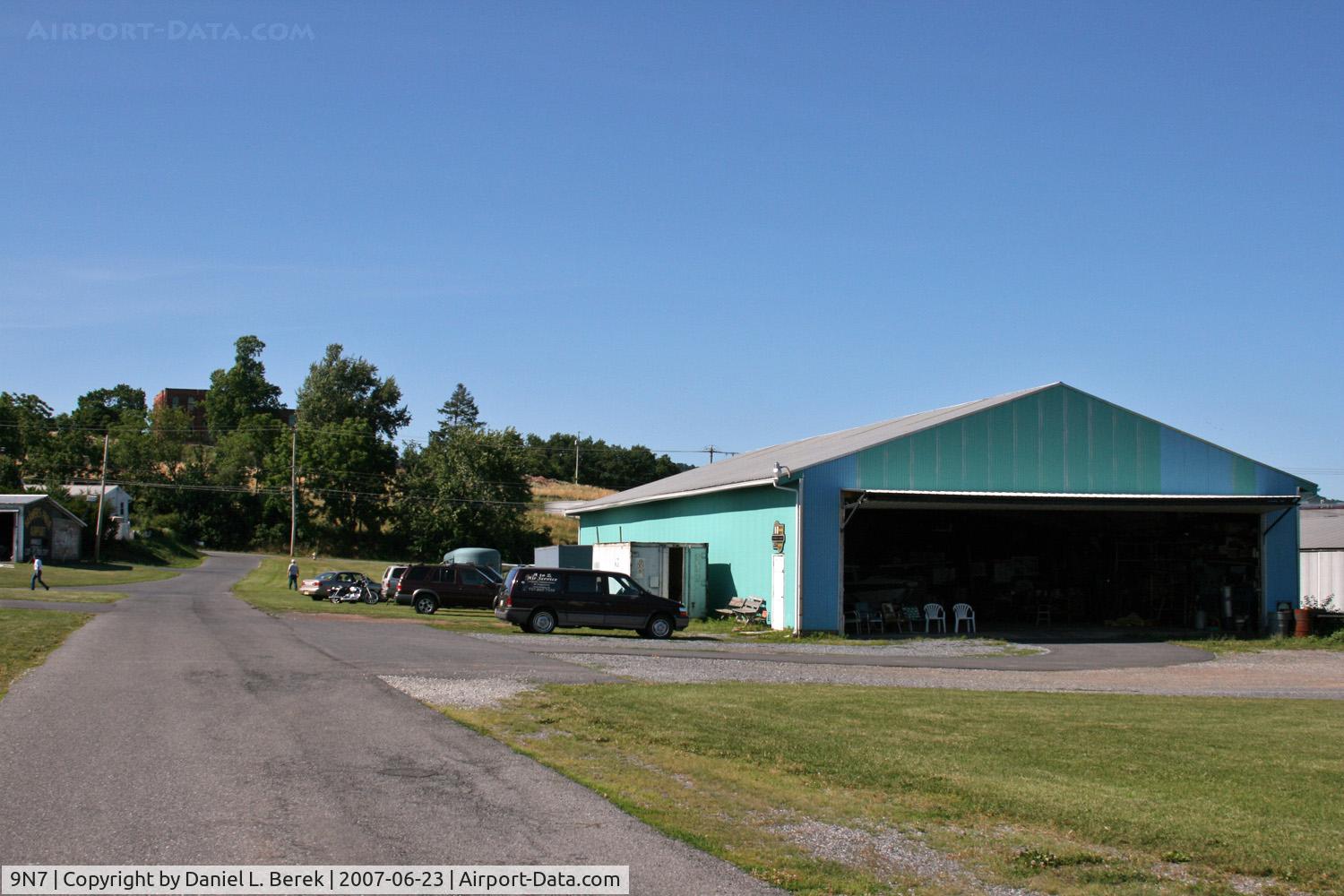 Farmers Pride Airport (9N7) - The hangars at Farmers Pride are home to all sorts of interesting aircraft restorations.