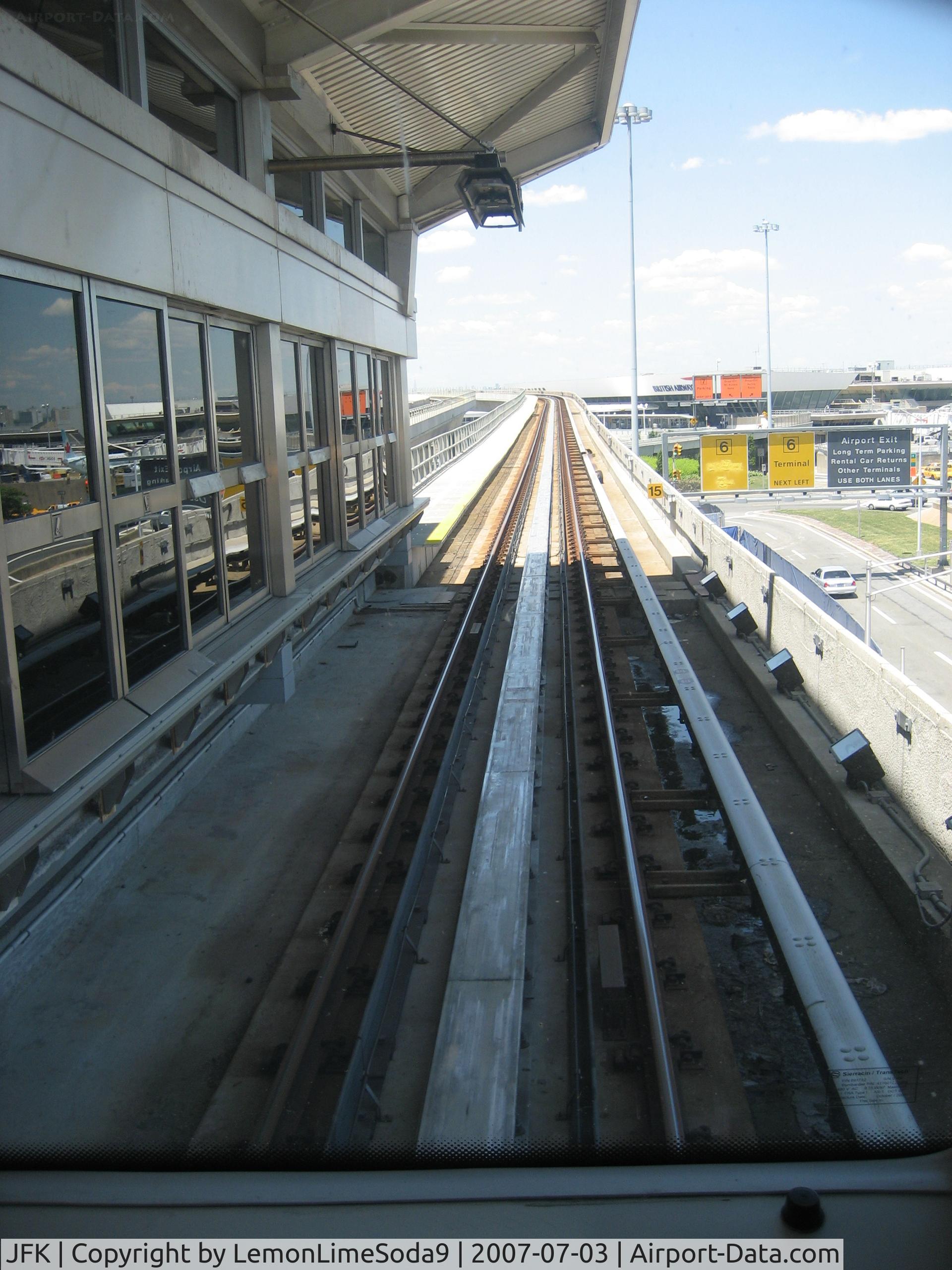 John F Kennedy International Airport (JFK) - On the Air Train going around JKF.