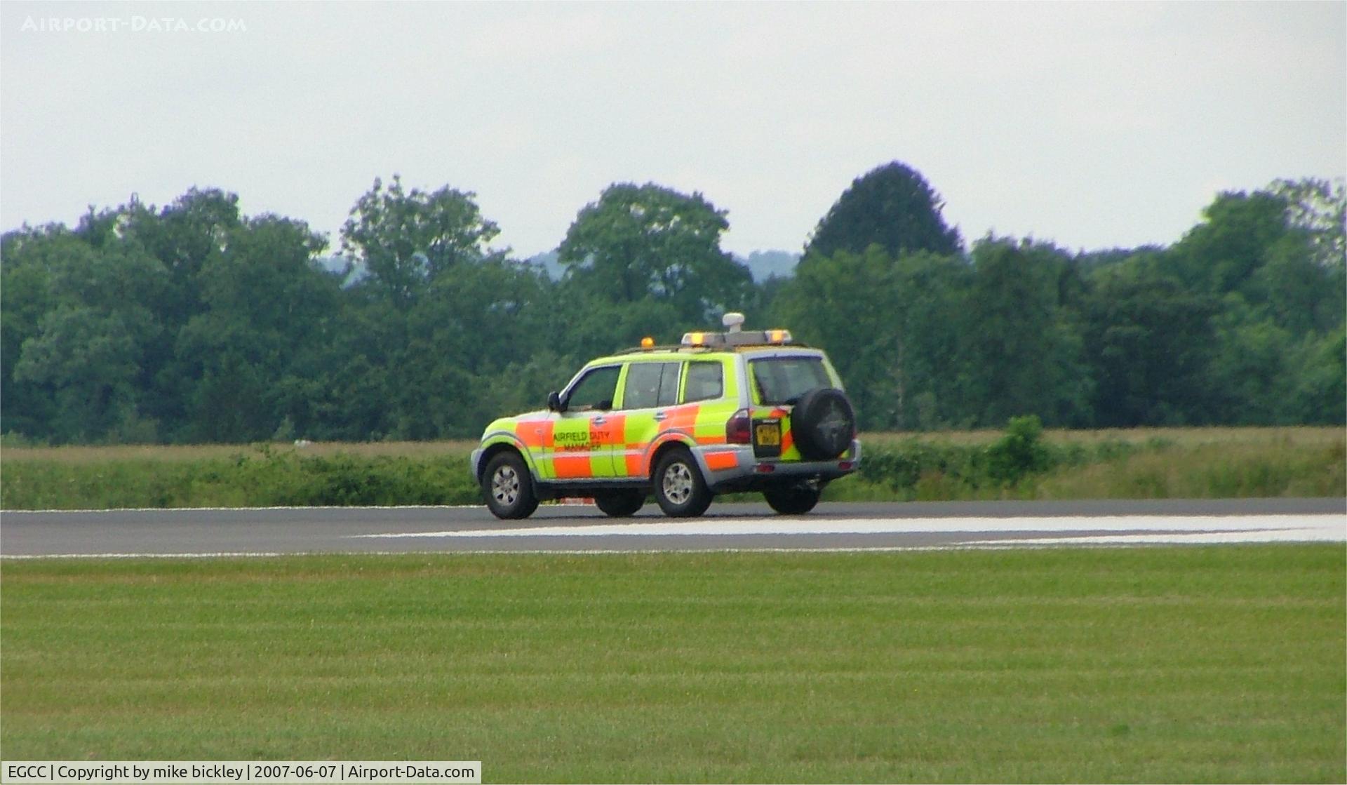 Manchester Airport, Manchester, England United Kingdom (EGCC) - checking runway 24L before reopening