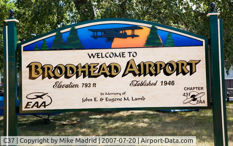 Brodhead Airport (C37) - Airport sign on the flight line
