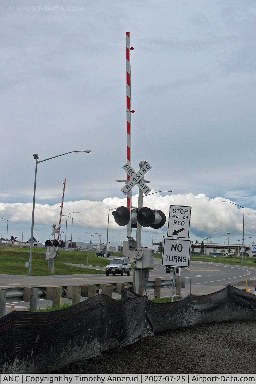 Ted Stevens Anchorage International Airport (ANC) - Aircraft Crossing connecting to transient parking area and Lake Hood Seaplane Base