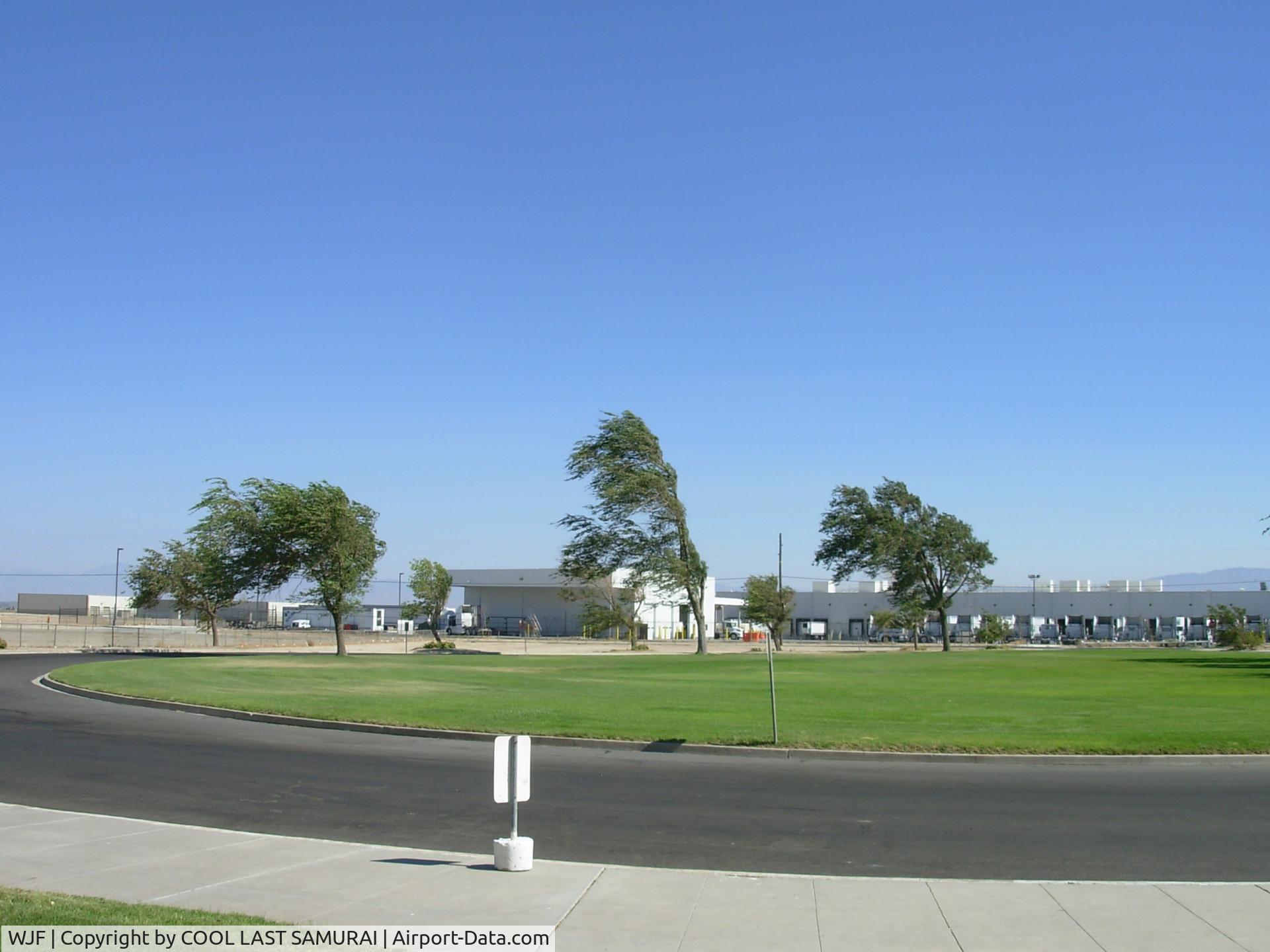 General Wm J Fox Airfield Airport (WJF) - WJF IS ALWAYS WINDY SO TREES AT ENTRANCE TILT LIKE THIS.