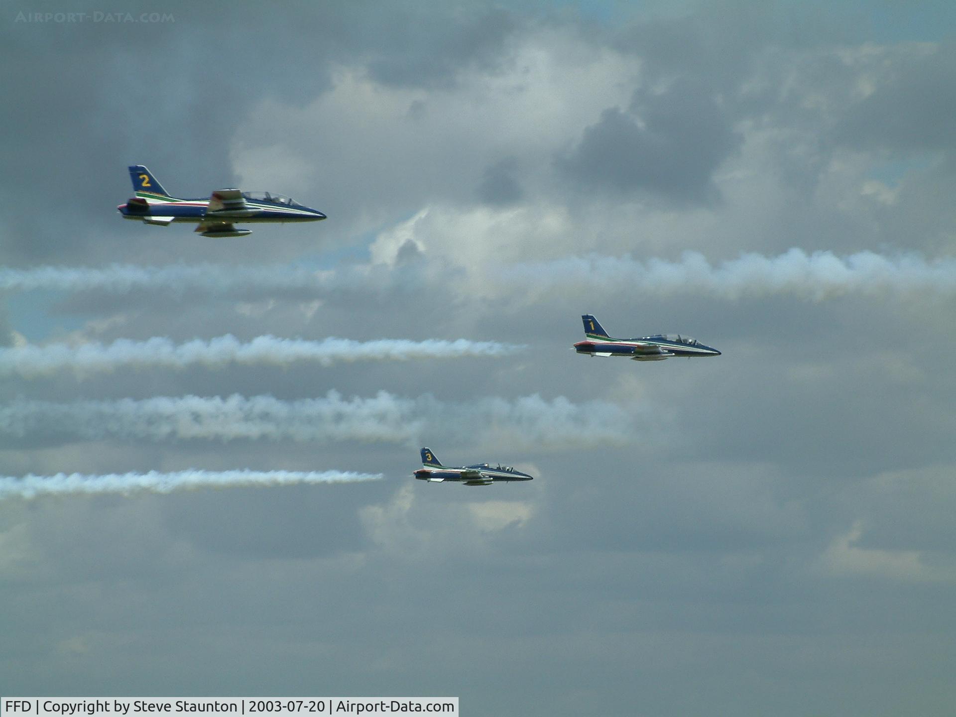 RAF Fairford Airport, Fairford, England United Kingdom (FFD) - Frecci Tricolori displaying at RIAT Fairford 2003.