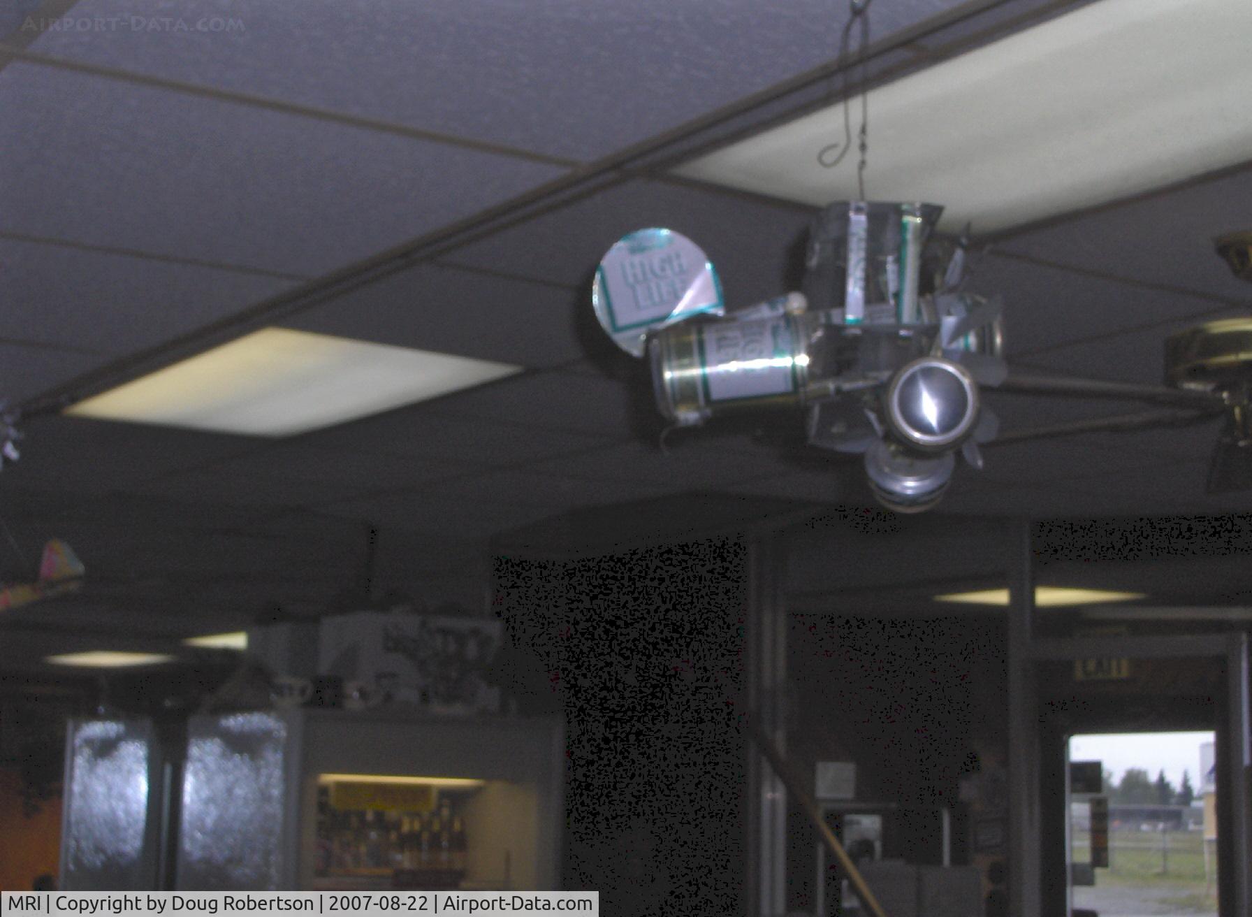 Merrill Field Airport (MRI) - Peggy's Airport Restaurant. Beer can biplane