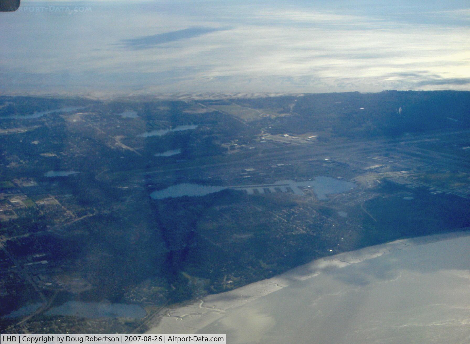 Lake Hood Seaplane Base (LHD) - Lake Hood SPB taken from Alaska Airlines B737-700 at altitude looking southwest by south. Knik Arm in foreground. Based aircraft-781, 760 single engine, 21 multi-engine. 190 average operations/day. August 2004 to August 2005 figures.