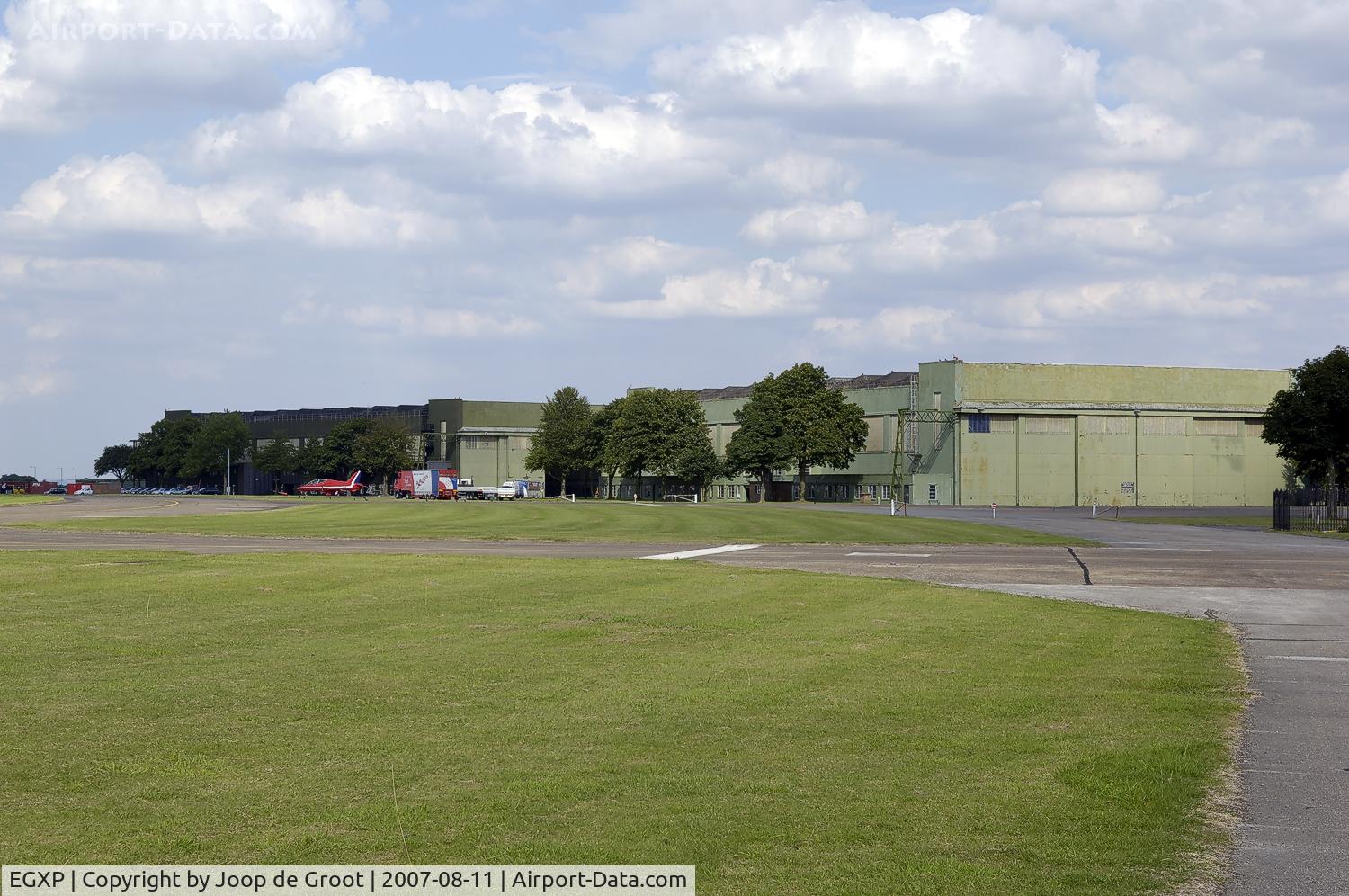 RAF Scampton Airport, Scampton, England United Kingdom (EGXP) - Flightline at RAF Scampton with Red Arrow Hawk