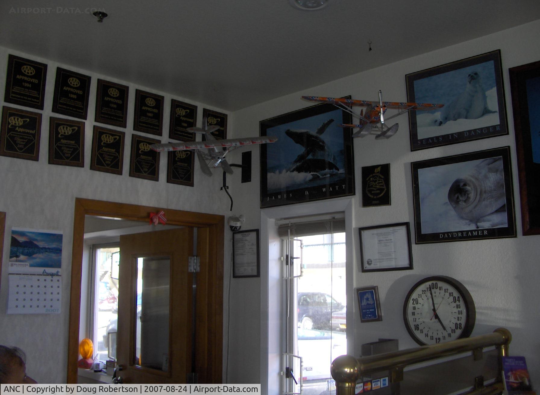 Ted Stevens Anchorage International Airport (ANC) - Beverage can amphibians hanging in ERA Aviation office space