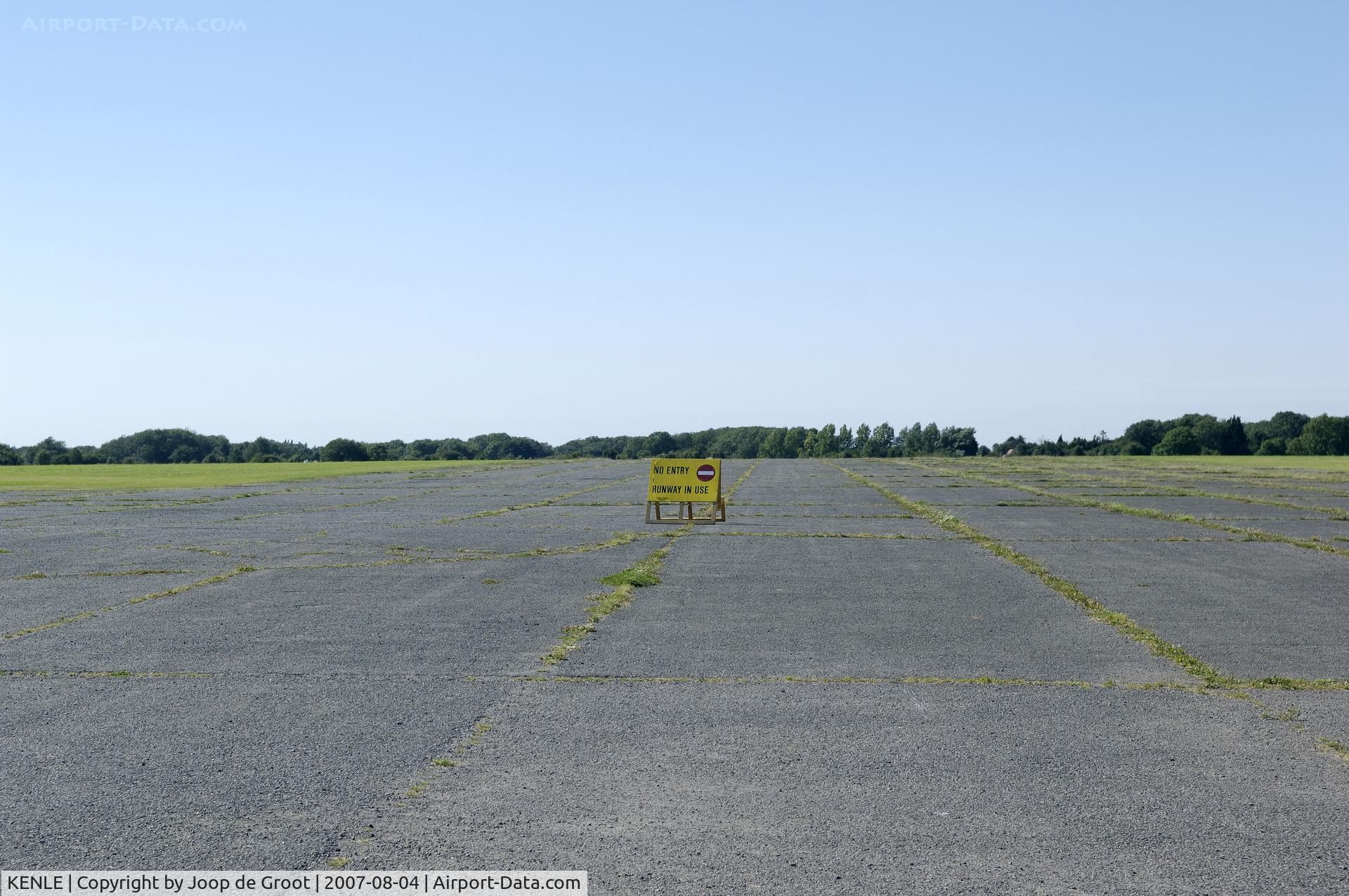 KENLE Airport - Sight across the secundary runway at Kenley. According to the sign the primary runway is in use.