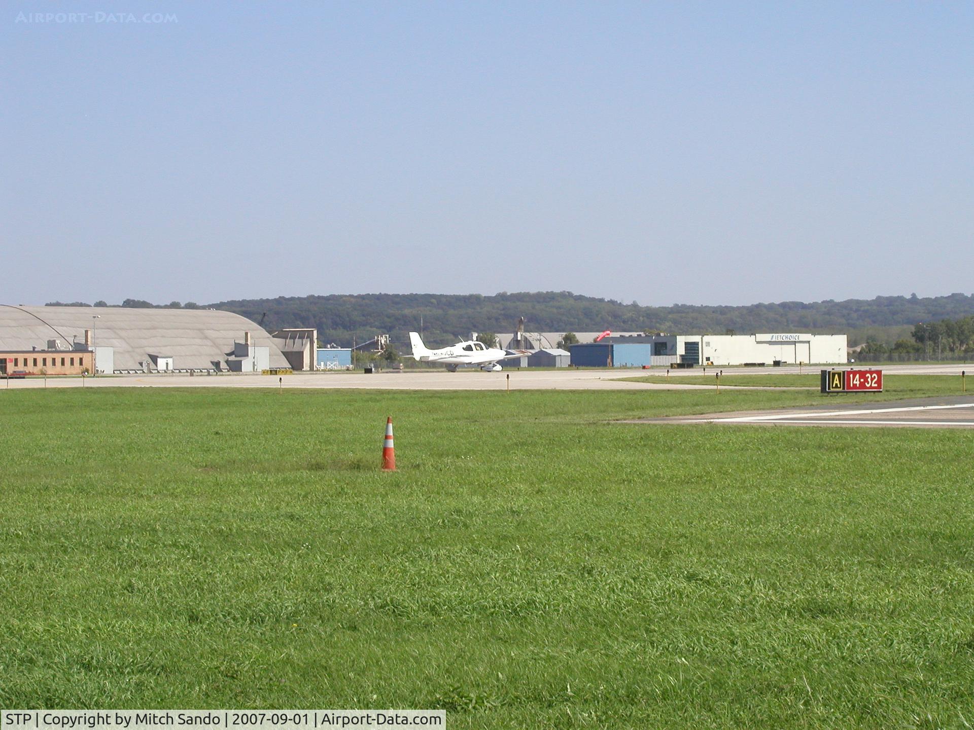 St Paul Downtown Holman Fld Airport (STP) - Cirrus 690CD taking off Runway 14 at St. Paul Downtown Airport (Holman Field).