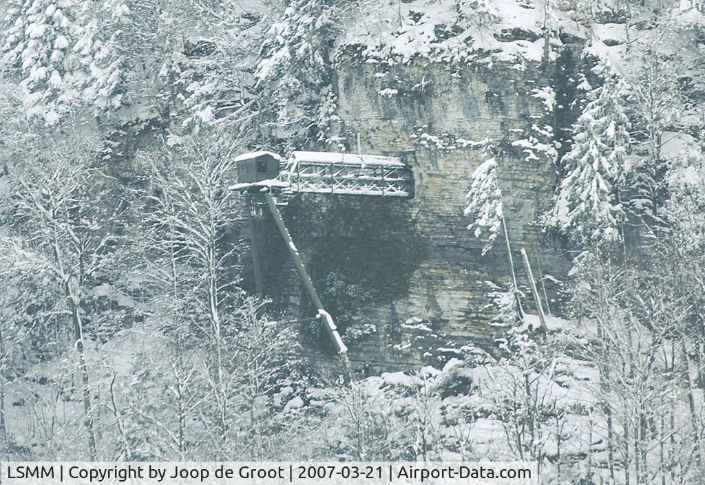LSMM Airport - Meiringen air base has a control towed mounted to the mountain slope. This is used during exercises and in wartime situations. It can be reached via a bridge ending in the mountain.