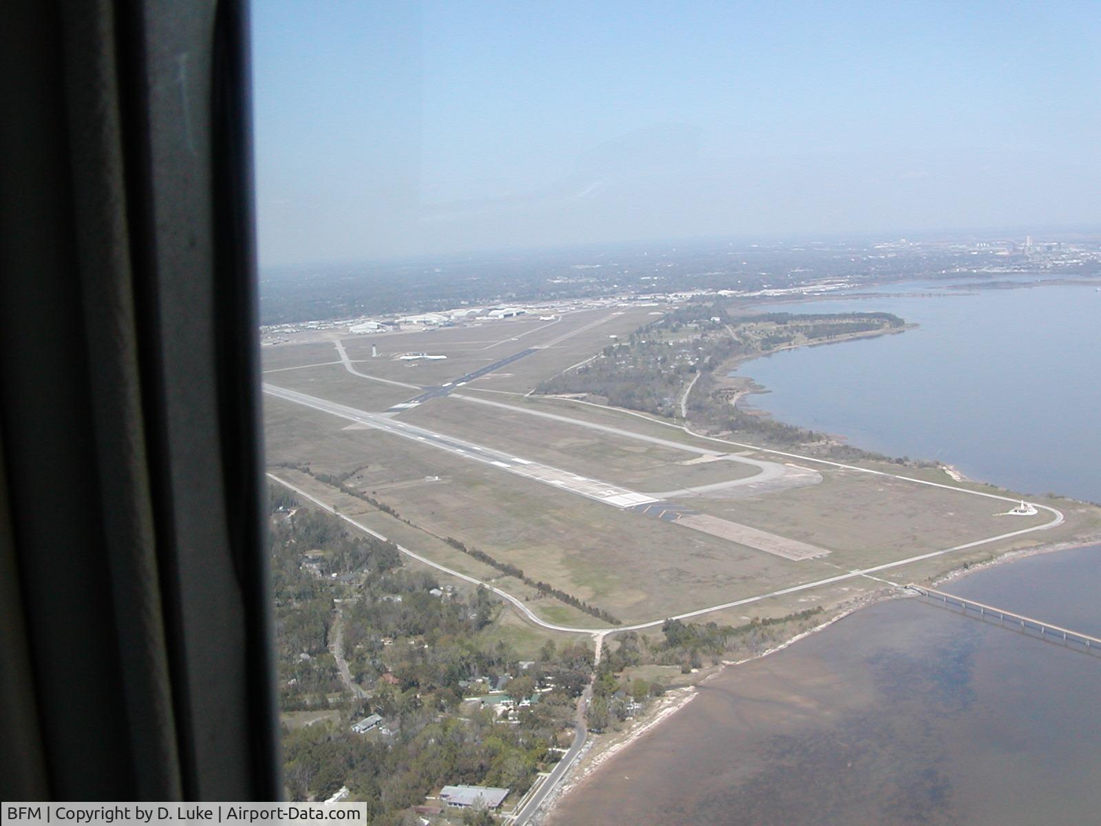Mobile Downtown Airport (BFM) - Entering right downwind, RWY 14.  Mobile Bay at right.