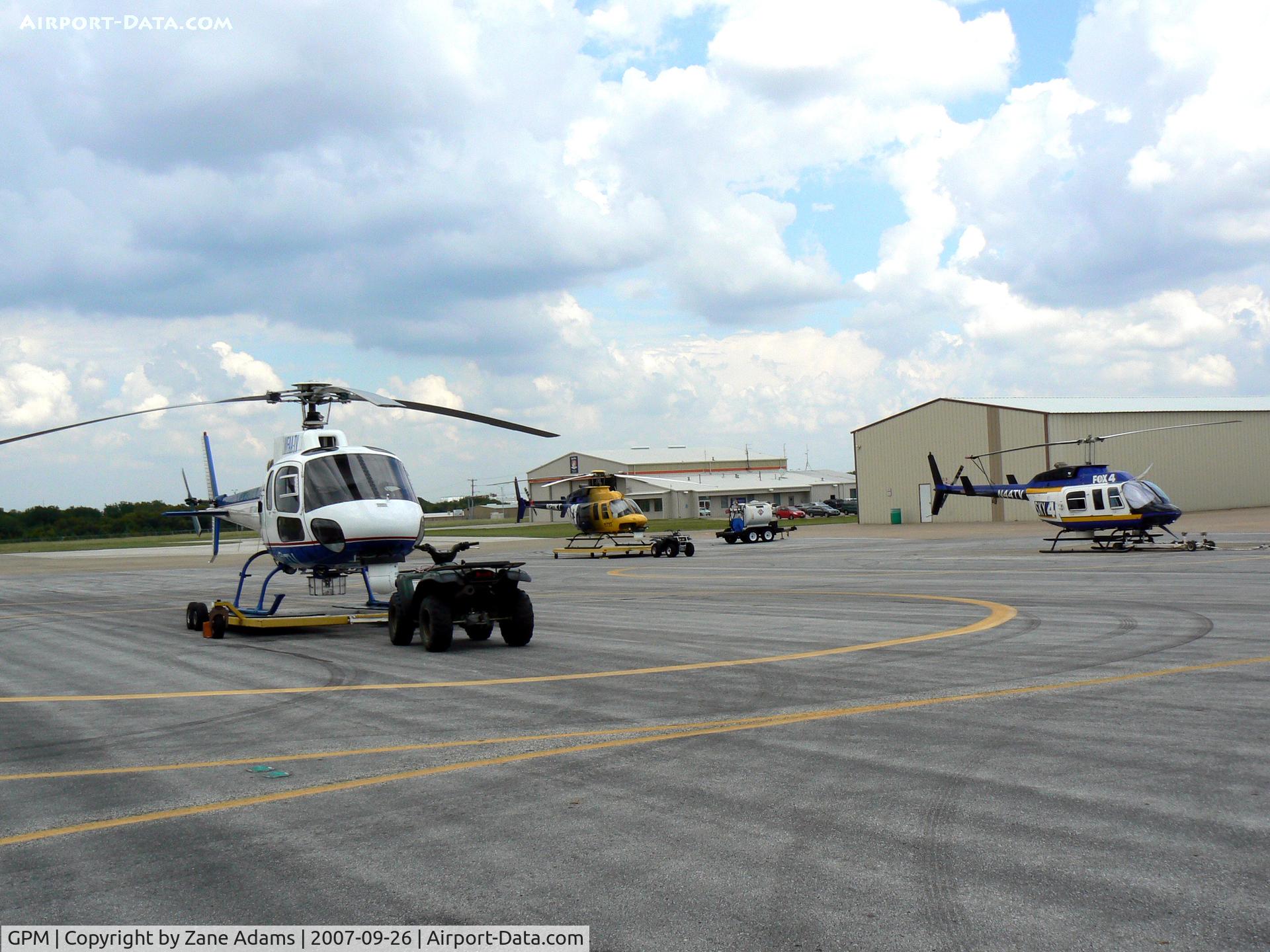Grand Prairie Municipal Airport (GPM) - Chanel 8, 4, 11 on the ramp at Grand Prairie