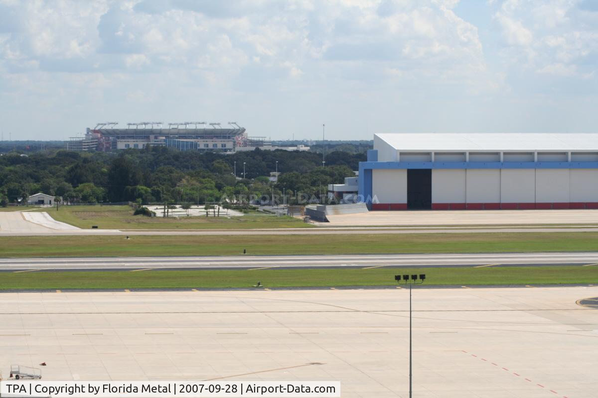 Tampa International Airport (TPA) - hangar with Raymond James Stadium (Tampa Bay Bucs)