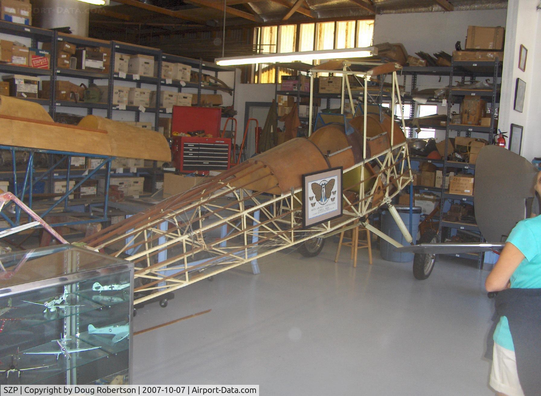 Santa Paula Airport (SZP) - DeHavilland Gipsy Moth and Tiger Moth parts in David Watson Museum Hangar