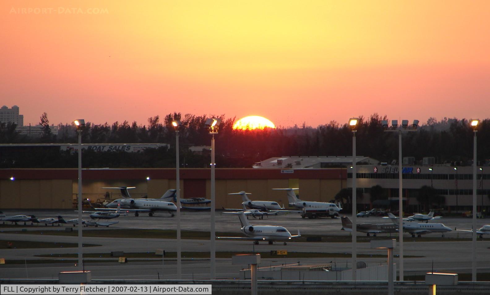 Fort Lauderdale/hollywood International Airport (FLL) - The sunsets over the busy FBO during Miami Boat Show Week