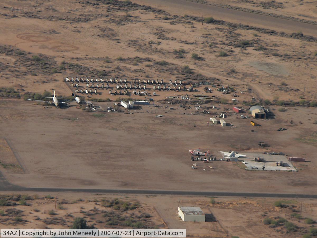 Gila River Memorial Airport (34AZ) - Winding down ... The concrete slab is where the T&G (Air Response) hangar used to be. Some PV2s and a compound full  of H-19s still in evidence.