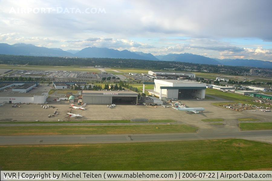 Vancouver International Airport, Vancouver, British Columbia Canada (YVR) - Taking off from Vancouver. Two DHC-8 from Air Canada jazz and an Airbus A330 from Air Canada can be seen in the foreground