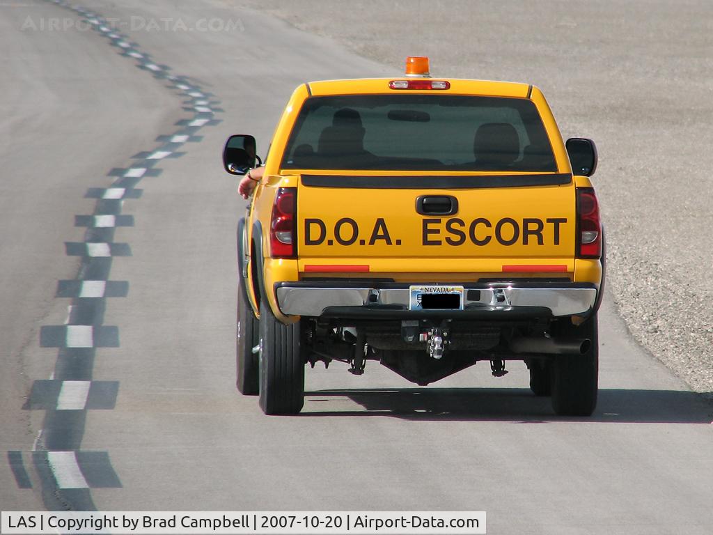 Harry Reid International Airport (LAS) - McCarran Airport D.O.A. Escort (I cut out the plate number)