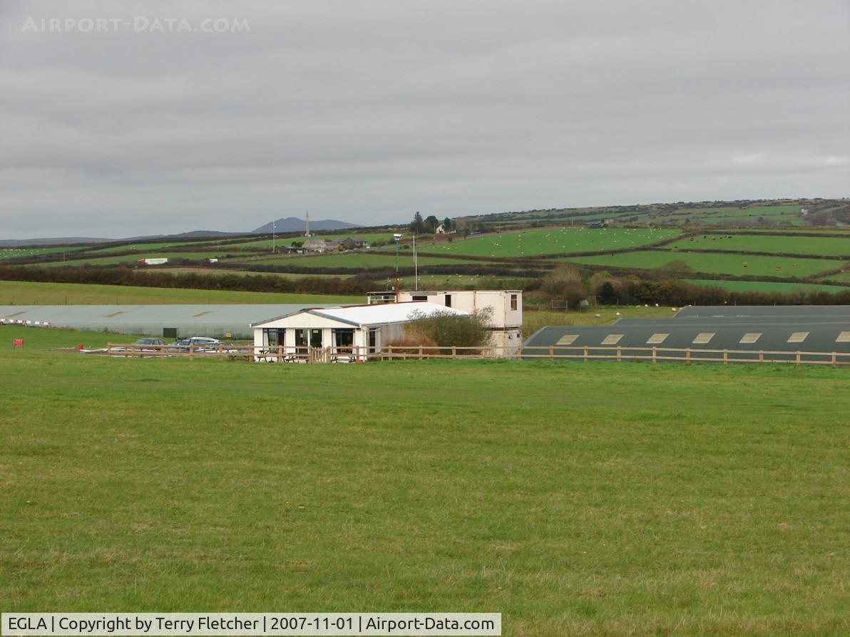 Bodmin Airfield Airport, Bodmin, England United Kingdom (EGLA) - Unusual to find the hangars below the level of the airstrip