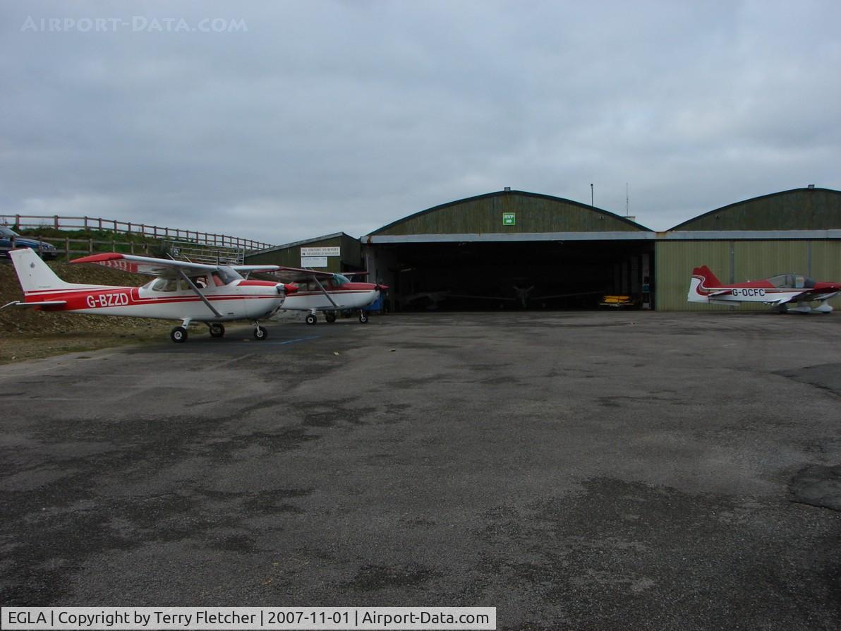 Bodmin Airfield Airport, Bodmin, England United Kingdom (EGLA) - Apron outside the main hangar