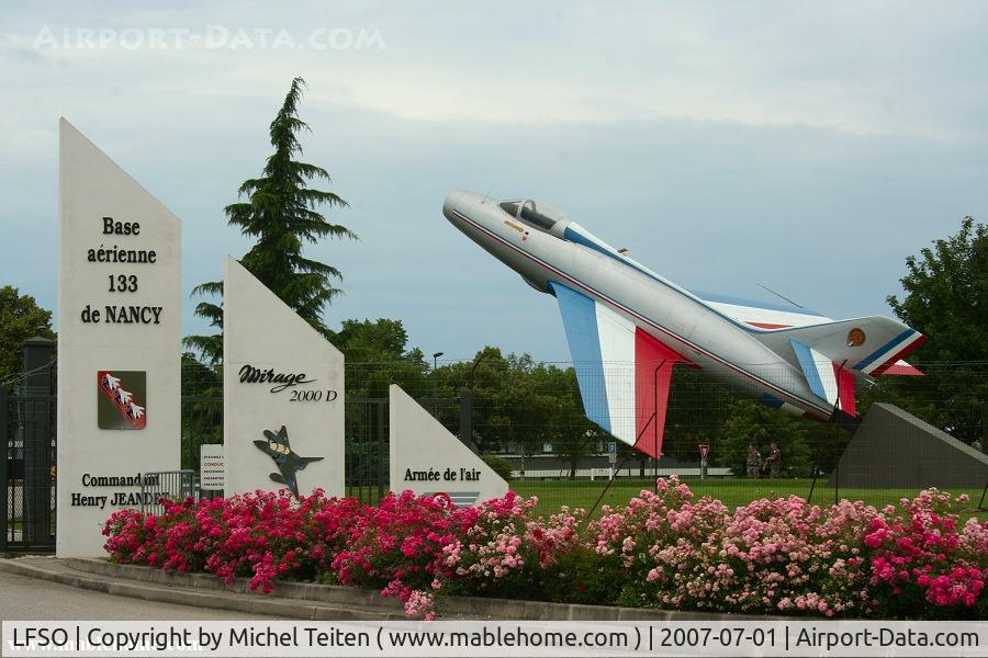 LFSO Airport - Main entrance of the Base Aerienne 133 - The Mystere IVA wears the Patrouille de France colors