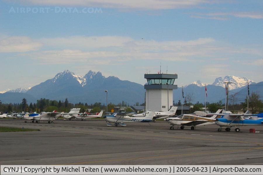 Langley Regional Airport, Langley, BC Canada (CYNJ) - The control tower with the beautiful BC mountains in the background