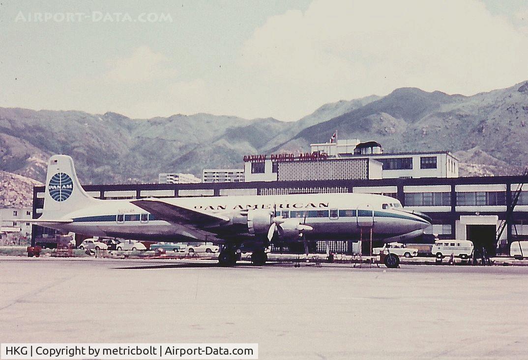 Hong Kong International Airport, Hong Kong Hong Kong (HKG) - PAA DC-6 used for US personnel in Vietnam R&R outside the PAA maintenance building in 1967