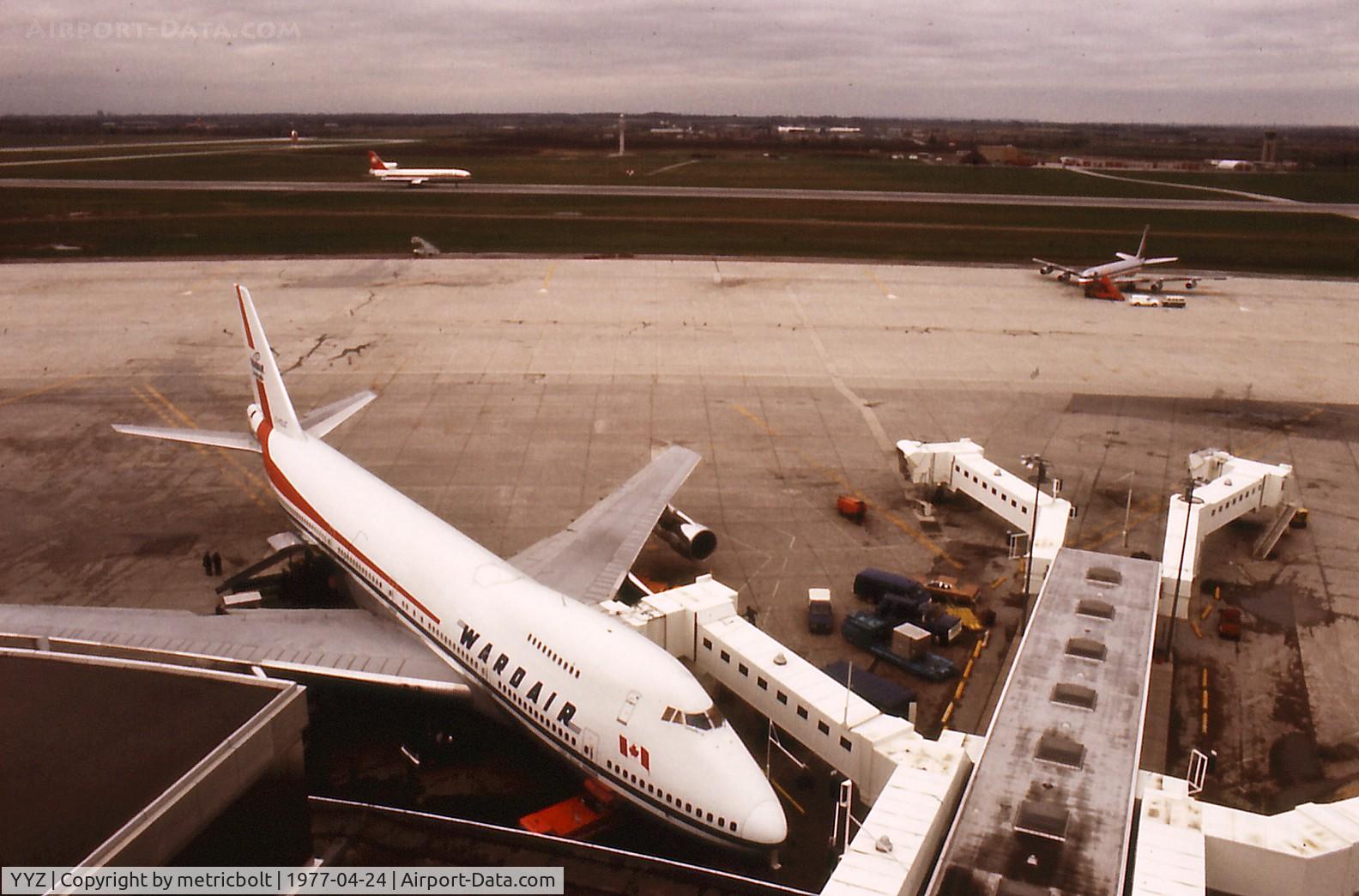 Toronto Pearson International Airport (Toronto/Lester B. Pearson International Airport, Pearson Airport), Toronto, Ontario Canada (YYZ) - Wardair B747,old terminal 1 YYZ,American B707 and Air Canada L-1011 in background