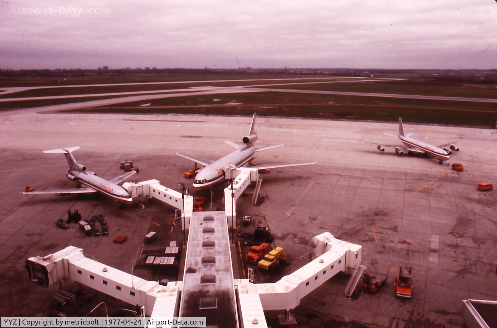 Toronto Pearson International Airport (Toronto/Lester B. Pearson International Airport, Pearson Airport), Toronto, Ontario Canada (YYZ) - American fleet at YYZ,old terminal 1 in 1977 .View from the carpark.