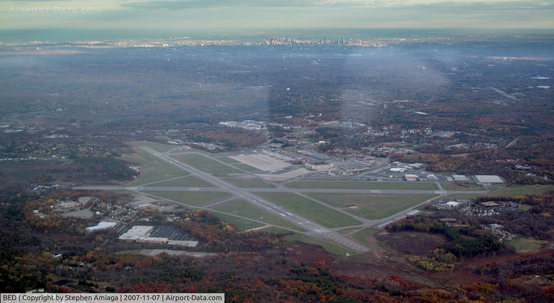 Laurence G Hanscom Fld Airport (BED) - Hanscom fm the W at 3000 MSL, Boston in distance